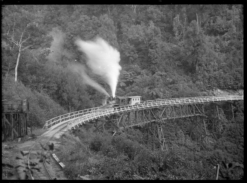 Climax Steam Locomotive Number Hauling Empty Logging Wagons On A