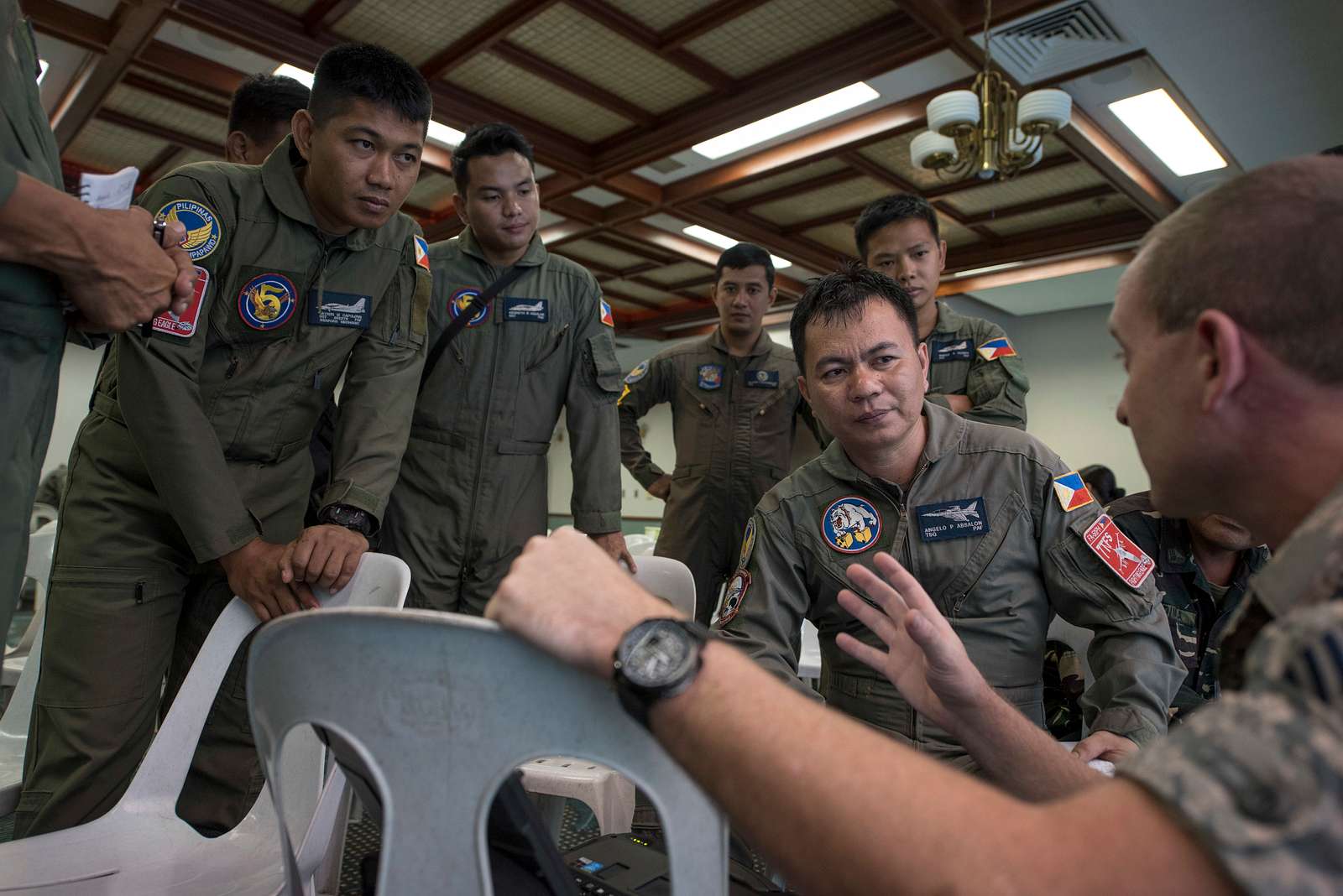 Members Of The Philippine Air Force Listen While A NARA DVIDS