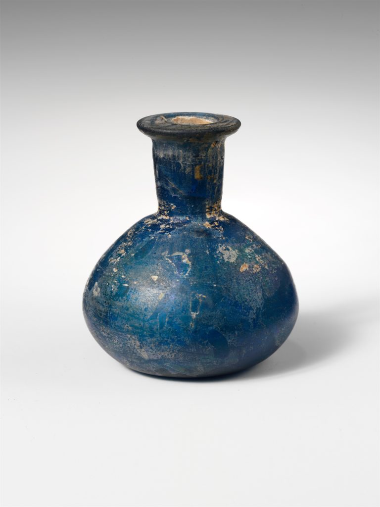 Roman Glass perfume bottle - Public domain museum image. A blue