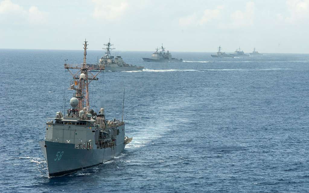 U.S. Navy ships with Destroyer Squadron (DESRON) 26 maneuver into ...