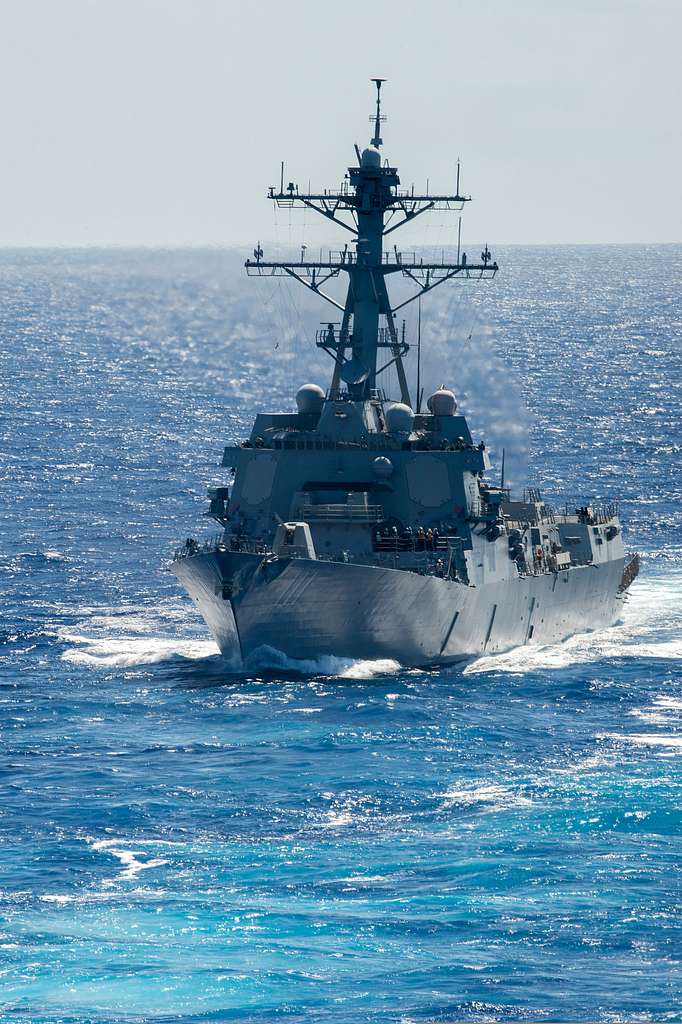 The guided missile destroyer USS Spruance (DDG 111) prepares to pull ...