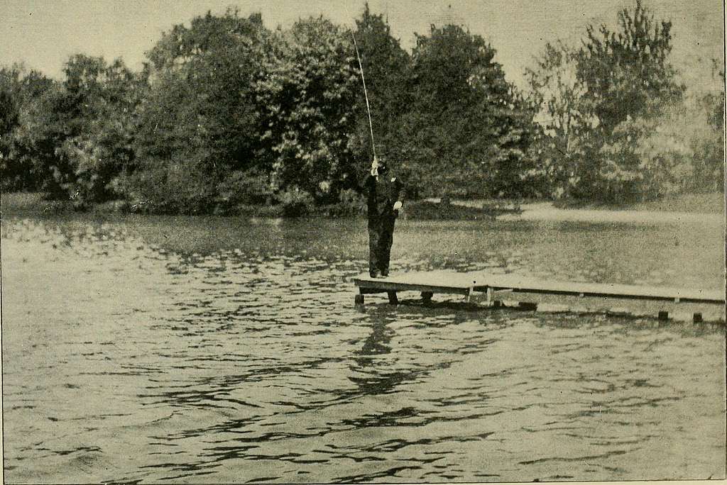 With fly-rod and camera (1890) (14596252619) - PICRYL - Public