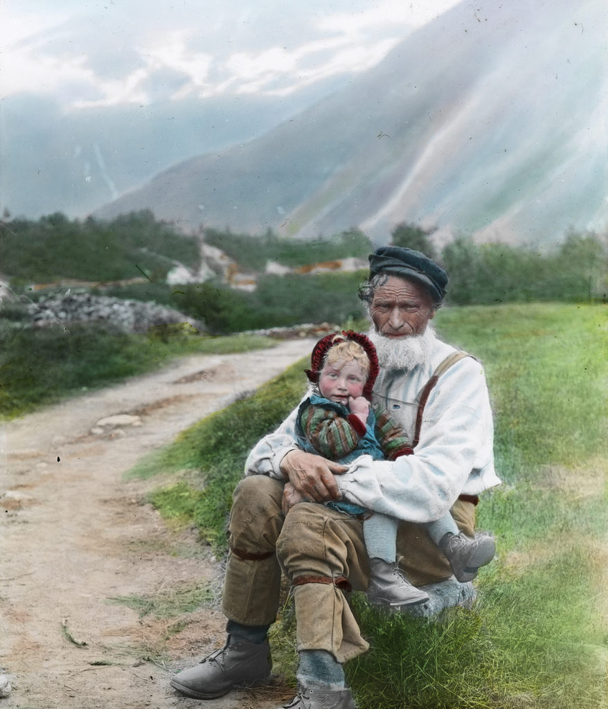 Man and child, lantern slide - An old photo of a man holding a child