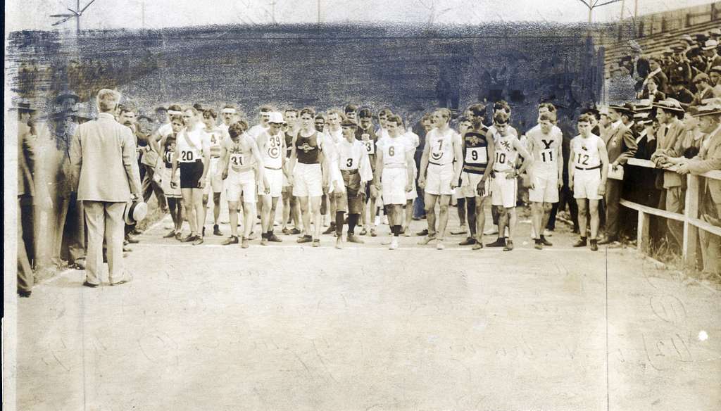 1904 Olympics- Runners lined up at start of Marathon Race, receiving ...