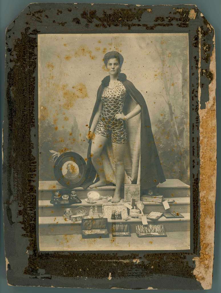 Photograph of Beatrice Kerr with a collection of personal items