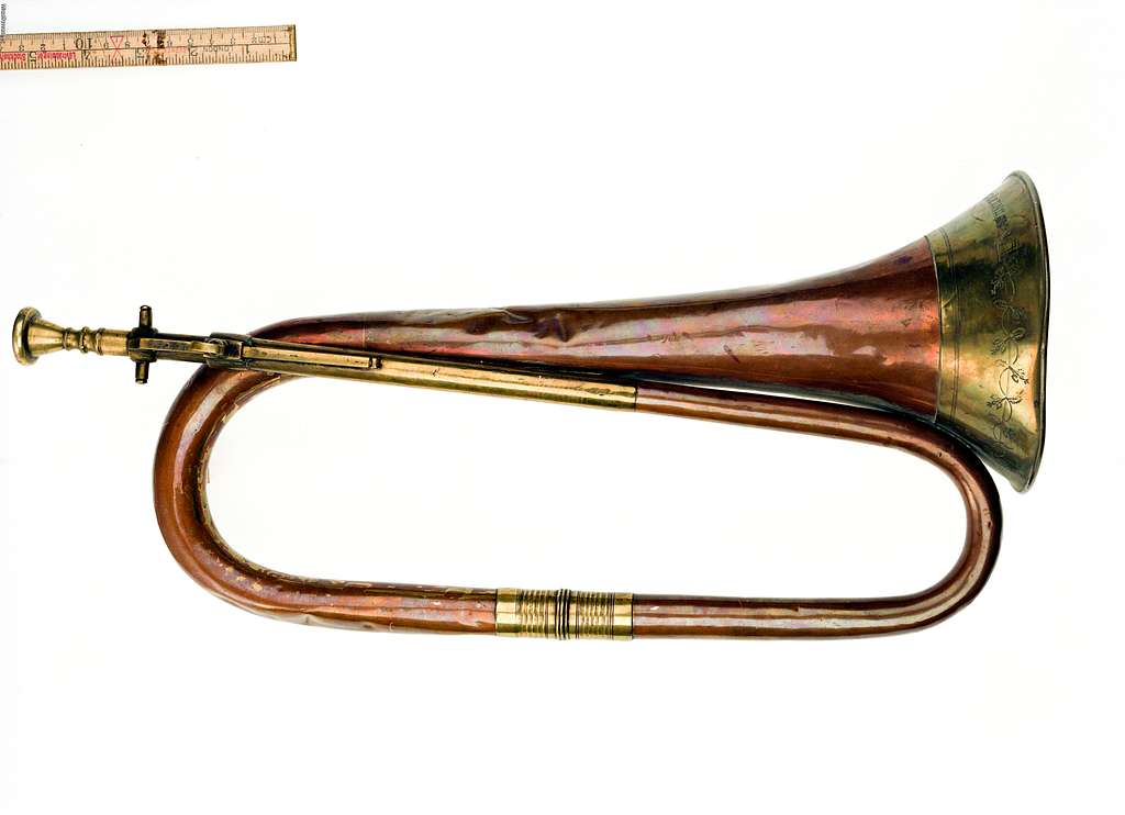 F78 Signalhorn - A brass and wood trumpet with a measuring tape in
