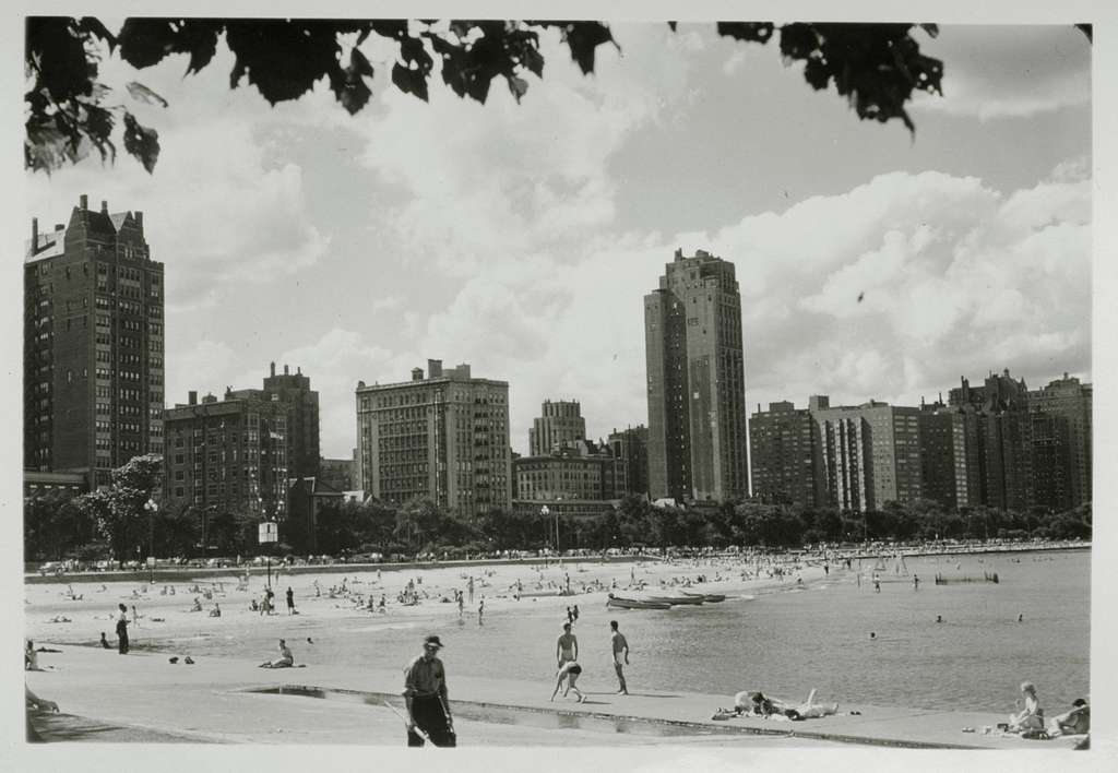 Chicago families socialize in the sun at the 12th Street beach on Lake  Michigan, Illinois, August, 1973. Image courtesy John White/US National  Archives Stock Photo - Alamy