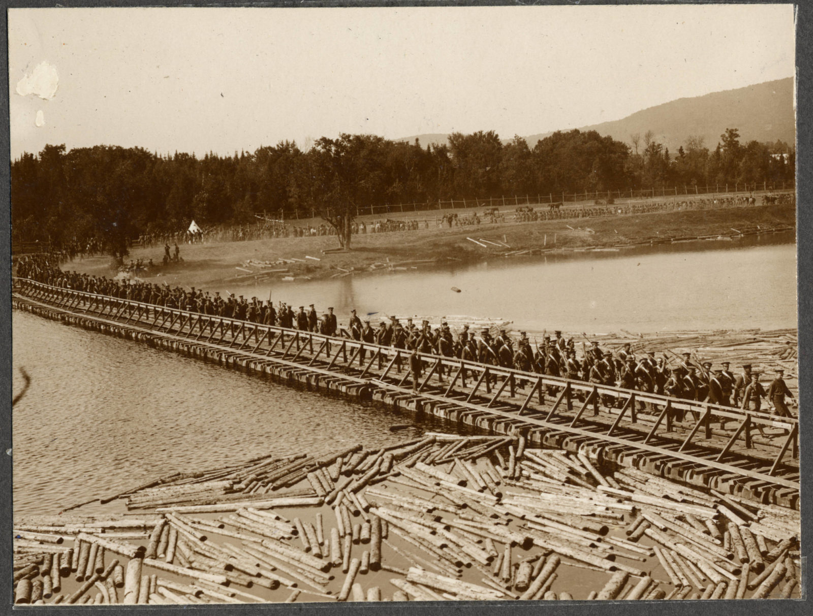 troops-marching-across-bridge-on-the-st-charles-river-built-by-the-canadian-9afb00-1600.jpg