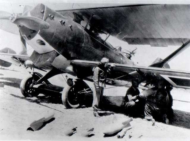 Sabiha Breguet 19 A black and white photo of a man sitting in