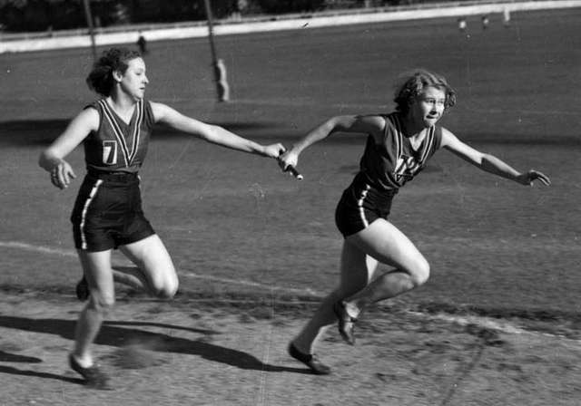 Runners Passing the Baton