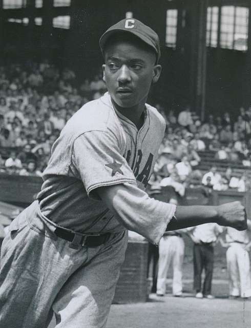 Joe Louis and Satchel Paige meet at Comiskey Park, 1948