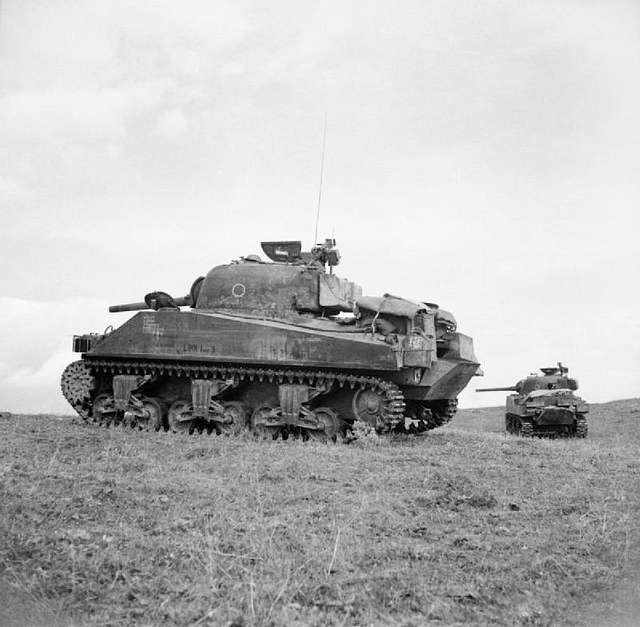 Sherman tanks of 46th Royal Tank Regiment provide fire support for the ...