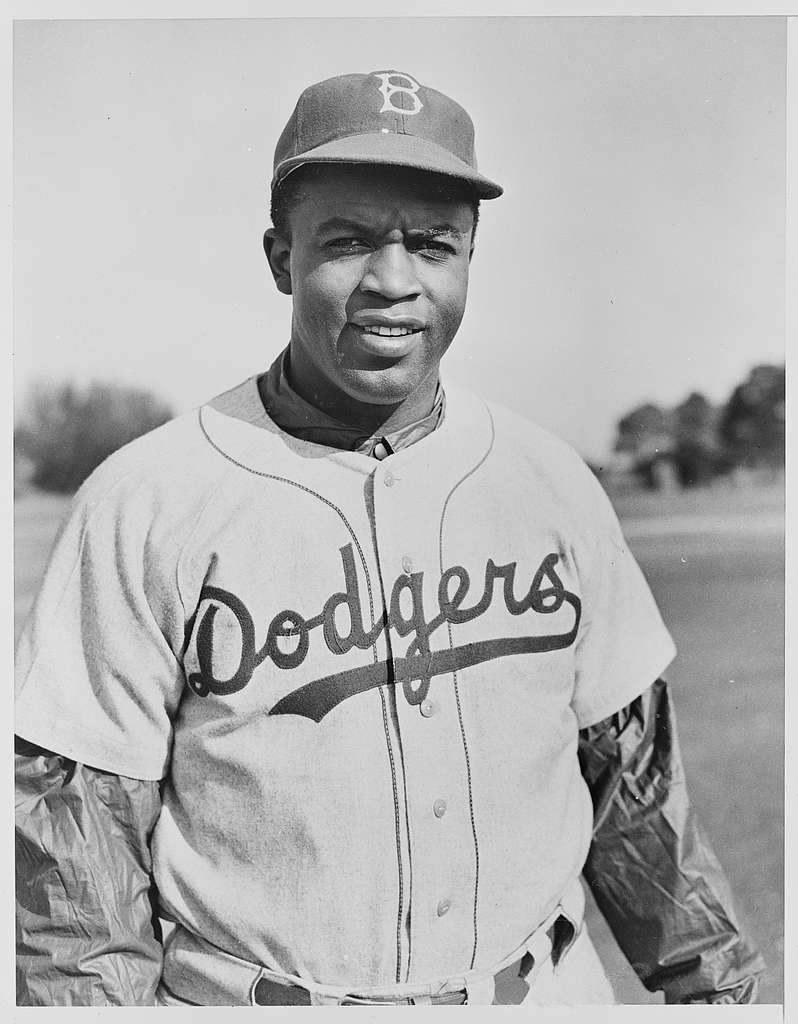  Jackie Robinson (1919-1972) Njohn Roosevelt Robinson Known As  Jackie American Baseball Player As A Member Of The Montreal Royals The Top  Minor-League Affiliate Of The Brooklyn Dodgers Shaking Hands Wi: Posters