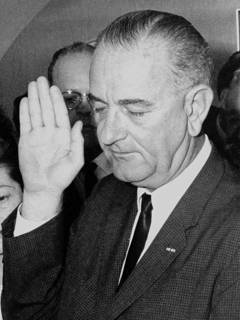 President Lyndon B. Johnson signs Public Law 90-130. The Nov. 8