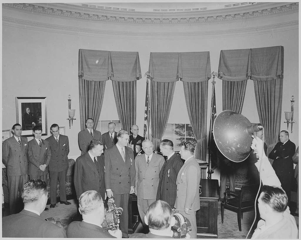 President Truman presents Gen. Dwight Eisenhower with the third
