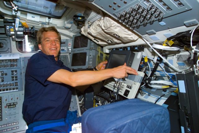 Parazynski on aft flight deck. NASA public domain image colelction ...