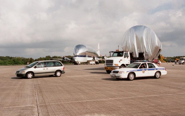 On the parking apron of the KSC Shuttle Landing Facility, near the Mate\/Demate device (seen in ...