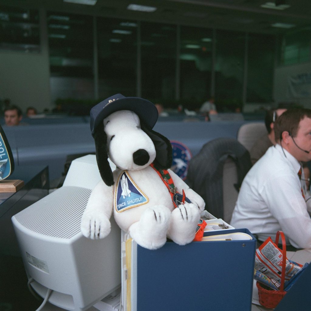 Stuffed Snoopy wearing cap and sporting a Space Shuttle emblem - PICRYL ...