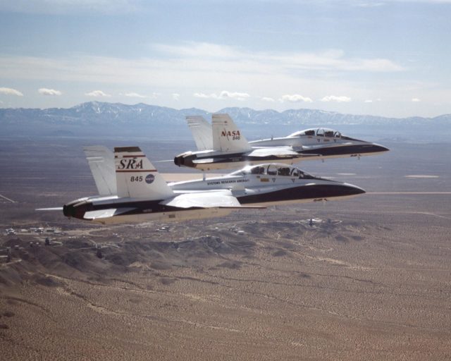 This unique view, looking directly up at two NASA Dryden F/A-18's used ...