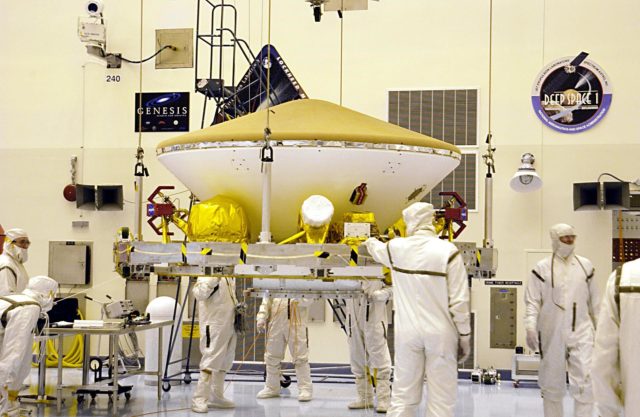 KENNEDY SPACE CENTER, FLA. - During processing, workers in the Payload ...