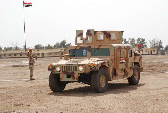 Two Iraqi soldiers drive off in an M1114 Humvee that - NARA & DVIDS ...