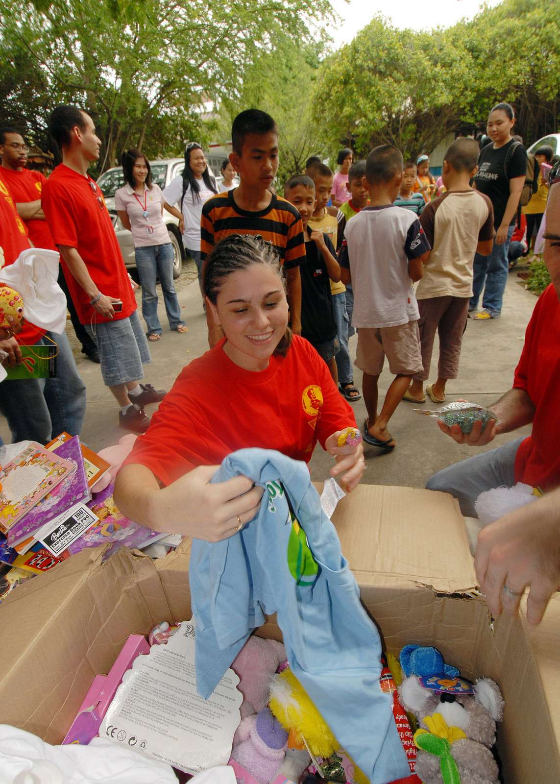 HIV-infected children receive toys during community relations project