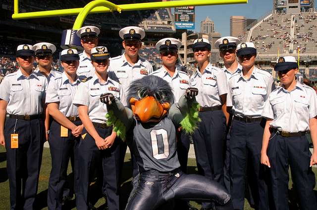 Seattle Seahawks defensive backs Shaquill Griffin and Delano Hall autograph  Seahawks memorabilia for U.S. Army and Navy service members at the change  of command celebration on Joint Base Lewis-McChord, WA., September 19