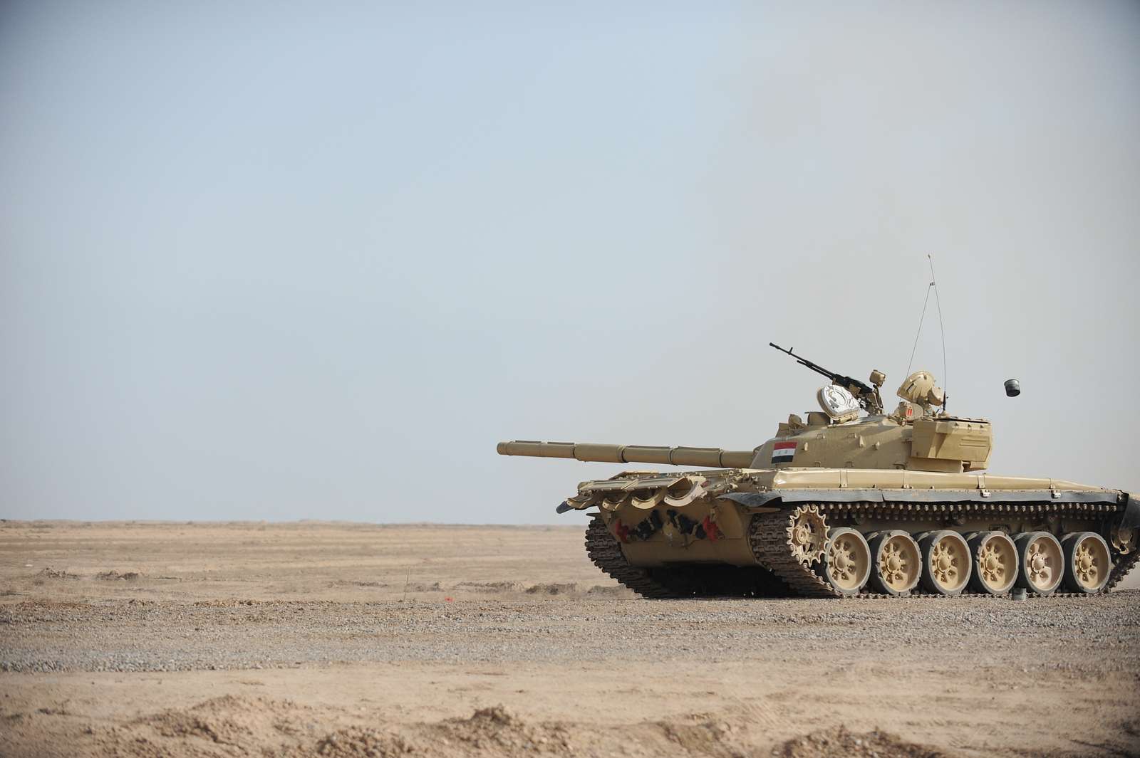 Empty casings eject from an Iraqi T-72 tank after being - NARA & DVIDS ...