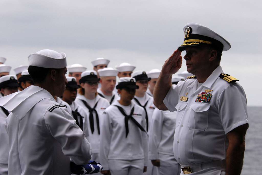 Seaman Apprentice Michael Burdios hands Capt. Kenneth - PICRYL - Public ...