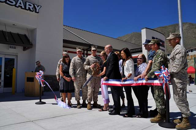 The San Diego Padres mascot, the Swinging Friar, greets Marines and sailors  with 3rd Battalion, 4th Marines, 7th Marine Regiment, during their  appearance at a military appreciation ceremony at a San Diego