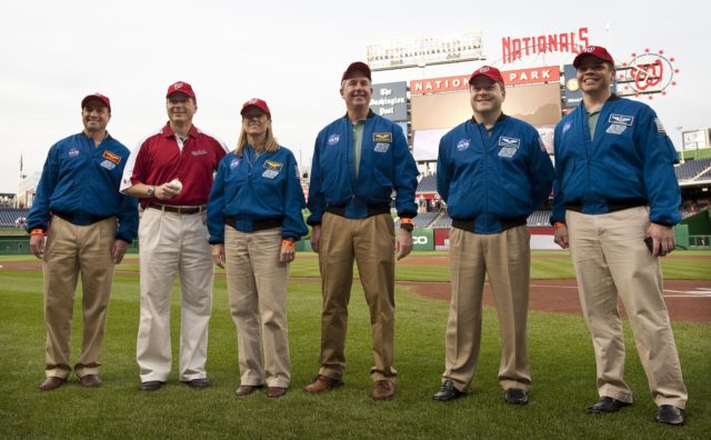 Screech, the Washington Nationals' mascot, offers Chief Navy Career  Counselor Michael Robinson his cover. - PICRYL - Public Domain Media Search  Engine Public Domain Search