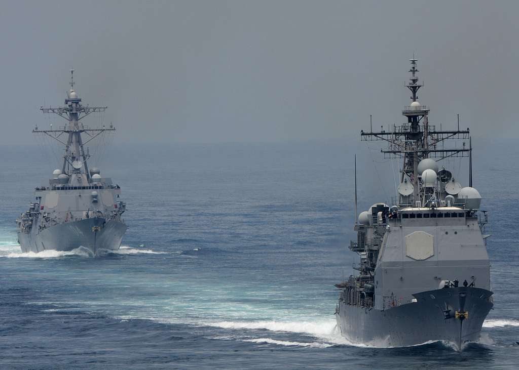 The guided-missile cruiser USS Cape St. George and - PICRYL Public ...