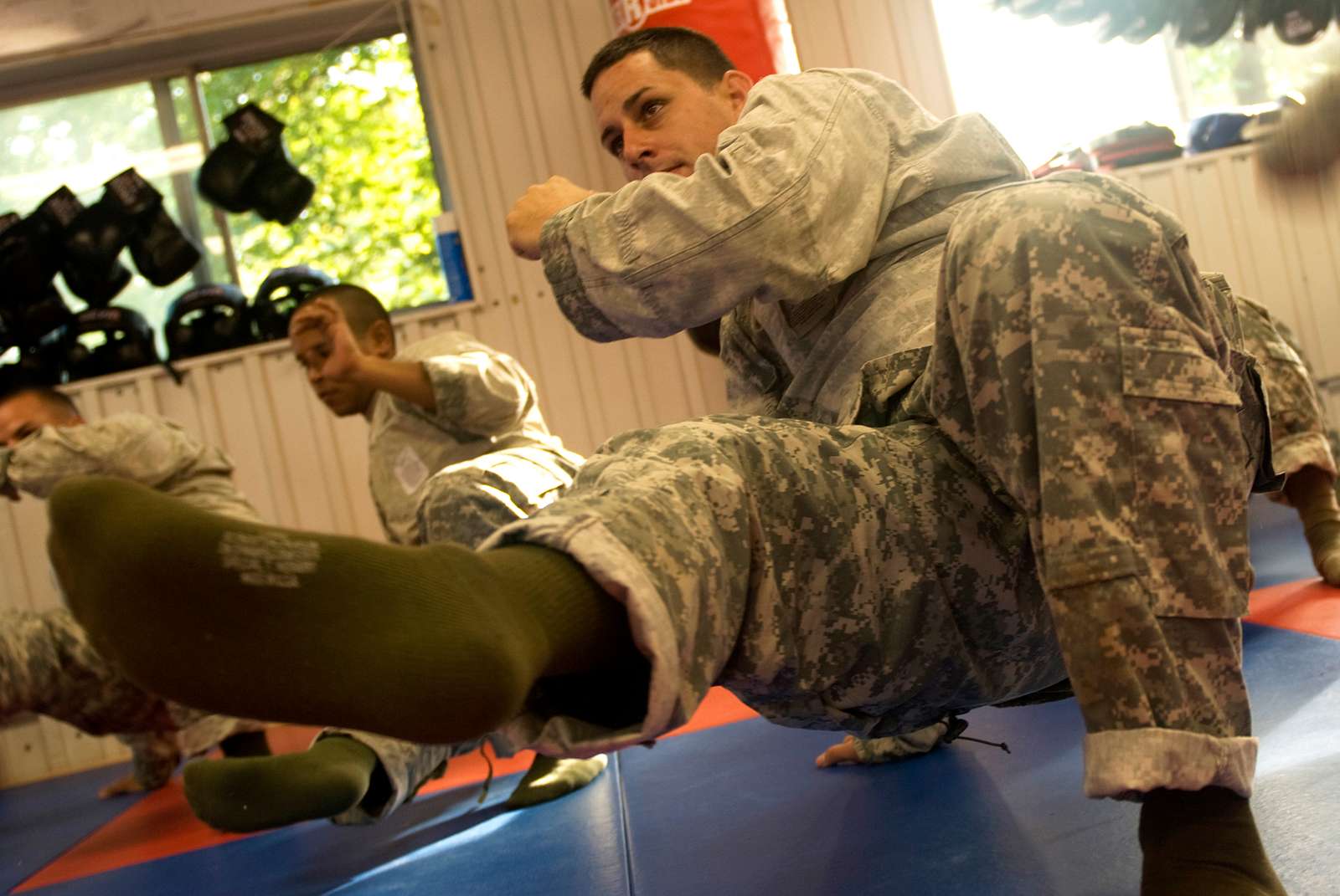 A Reserve soldier executes a kick during combatives - NARA & DVIDS ...