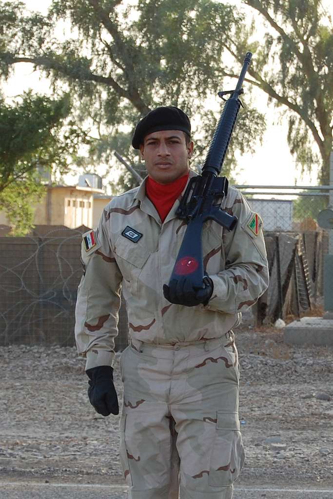 An Iraqi Army soldier wearing a red ascot and gloves—uniform - PICRYL ...