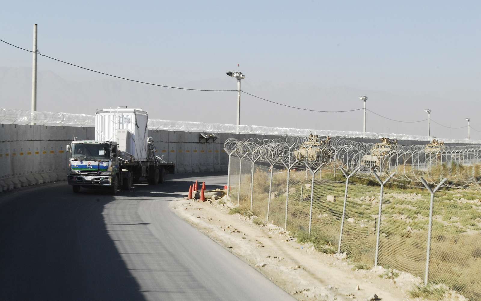 A truck carrying a cell tower destined to be the first - NARA & DVIDS ...