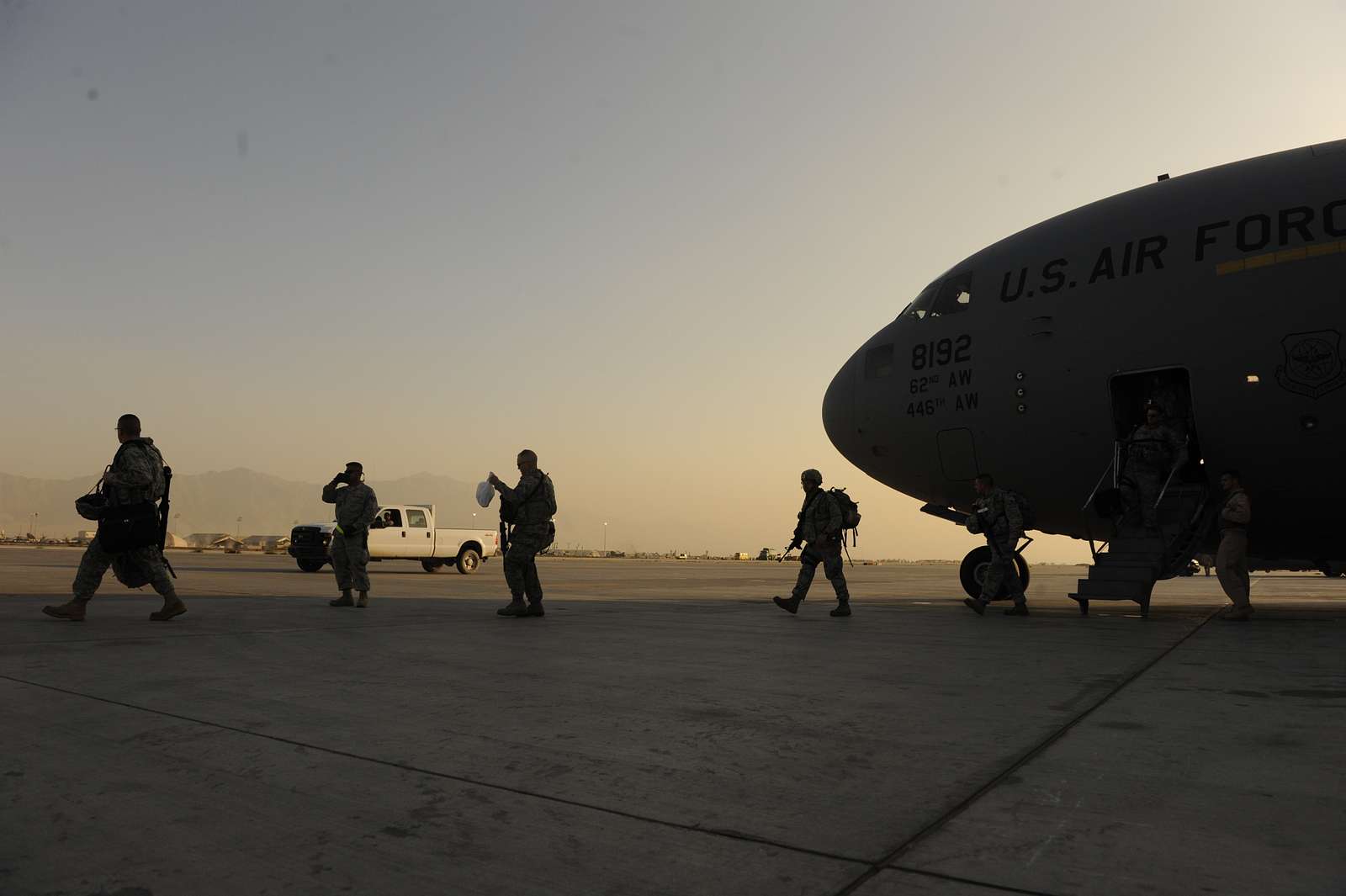 Passengers exit a C-17 Globemaster III at Bagram Airfield, - NARA ...