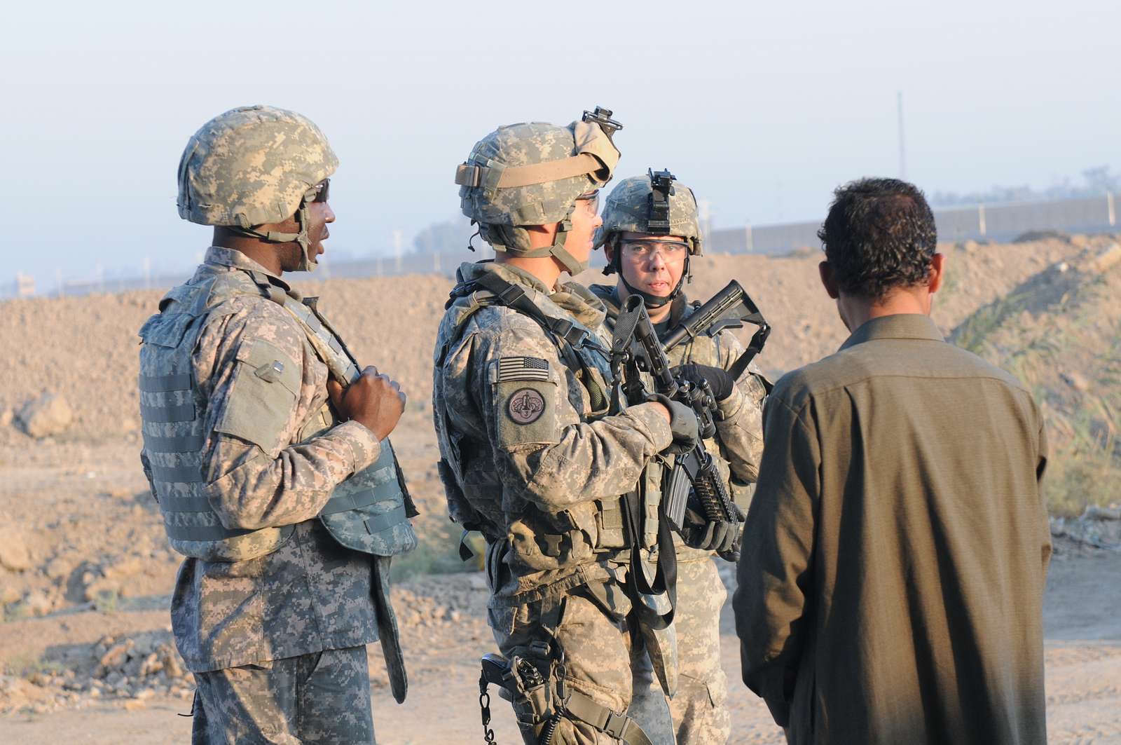 Sgt. Jason Roley and Pfc. Ruben Velasquez speak to - NARA & DVIDS ...