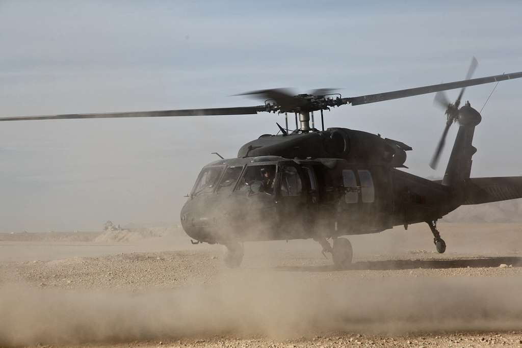 A UH-60 Black Hawk helicopter waits near the Deh Yak - NARA & DVIDS ...