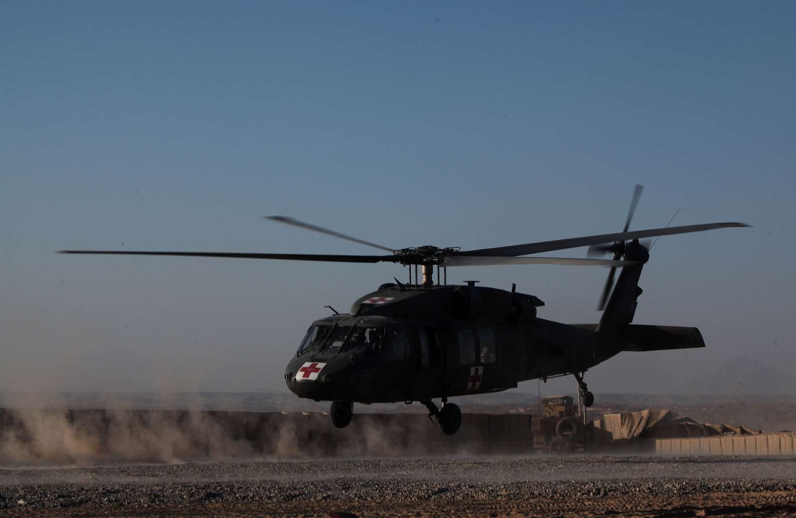 A Blackhawk helicopter takes off after collecting two - NARA & DVIDS ...