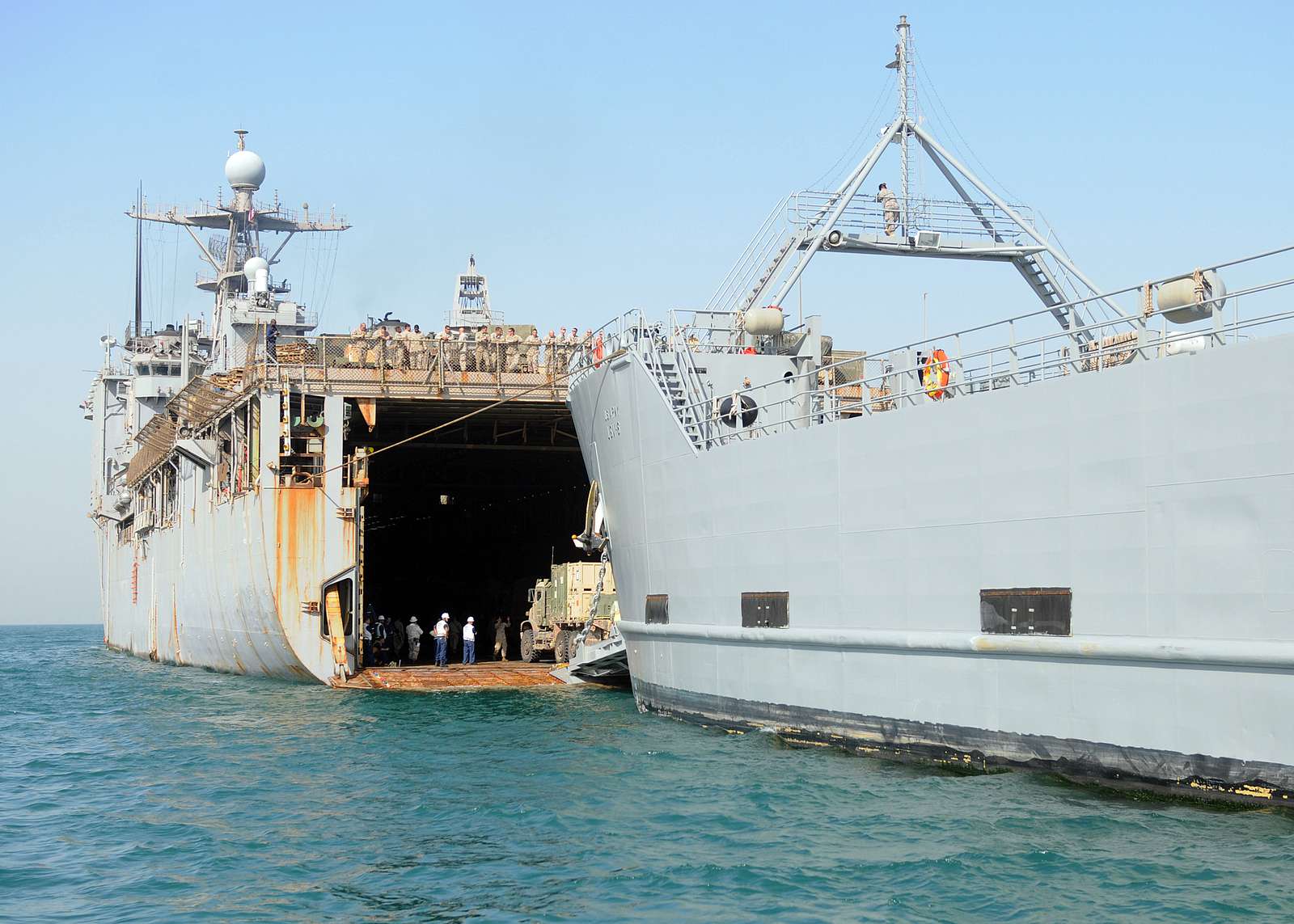 The amphibious dock landing ship USS Carter Hall performs - NARA ...