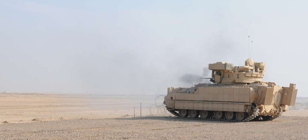 An M3A3 Cavalry Fighting Vehicle fires its 25mm gun - PICRYL - Public ...