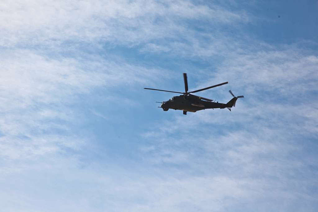 A HIND Helicopter provides security from above during - NARA & DVIDS ...