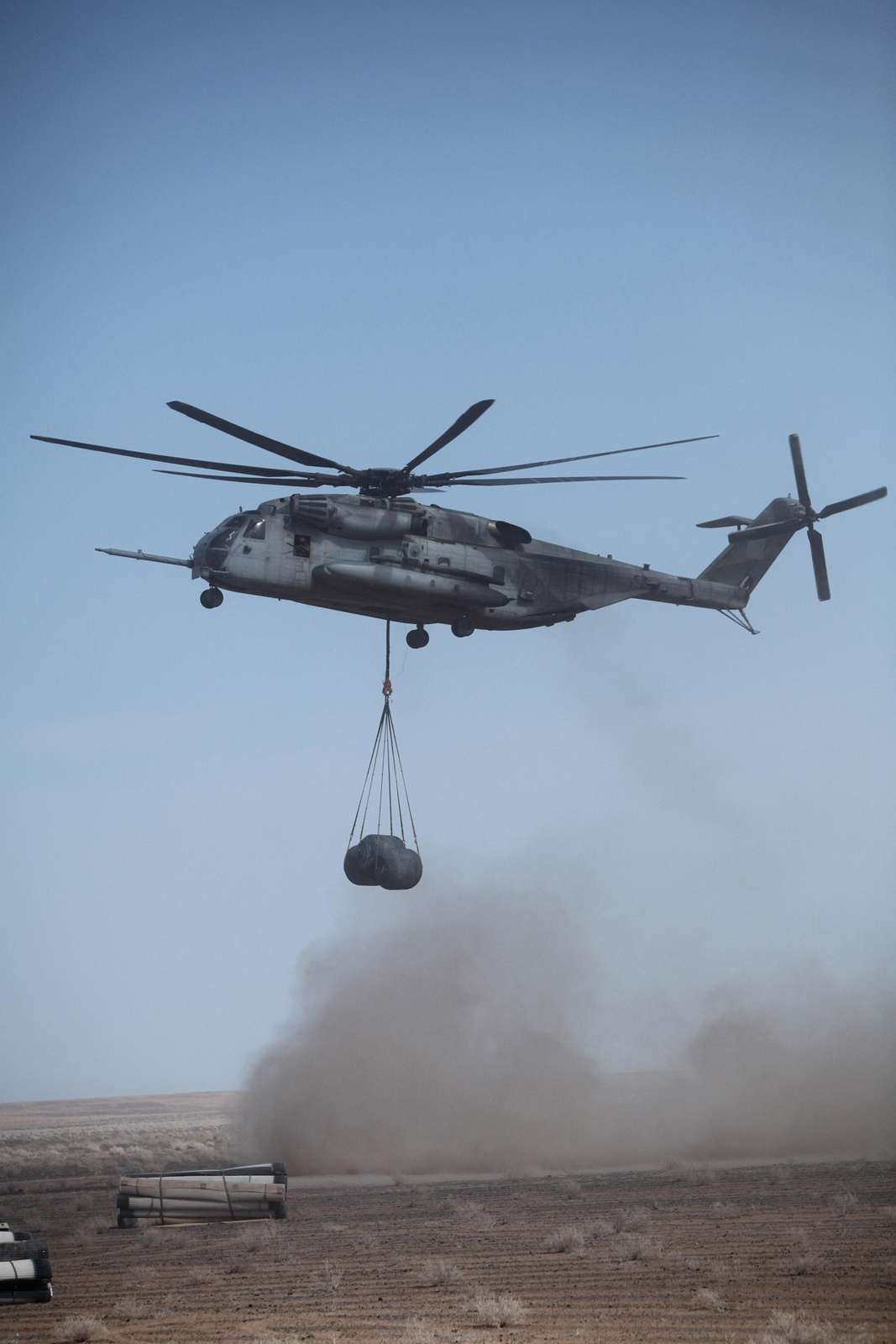 A CH-53 Sea Knight helicopter delivers fuel to a small - NARA & DVIDS ...