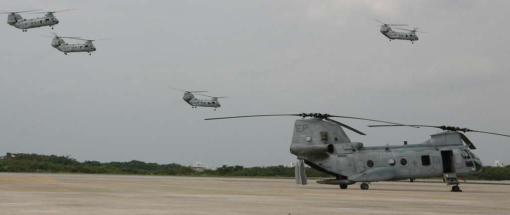 Two U.S. Marine Corps CH-46E Sea Knight helicopters in flight