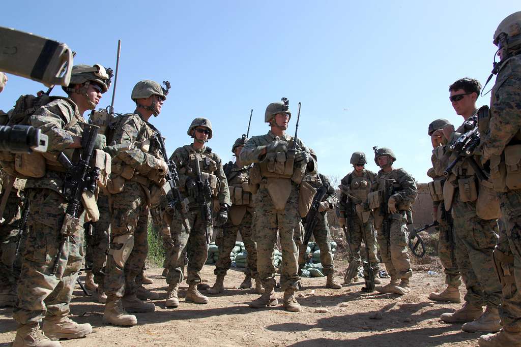 U.S. Marine Corps Sgt. Scott Mann (center), a squad - PICRYL Public ...