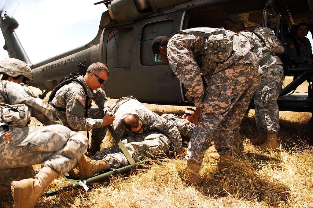 A U.S. Army medical personnel assigned to the 48th - NARA & DVIDS ...