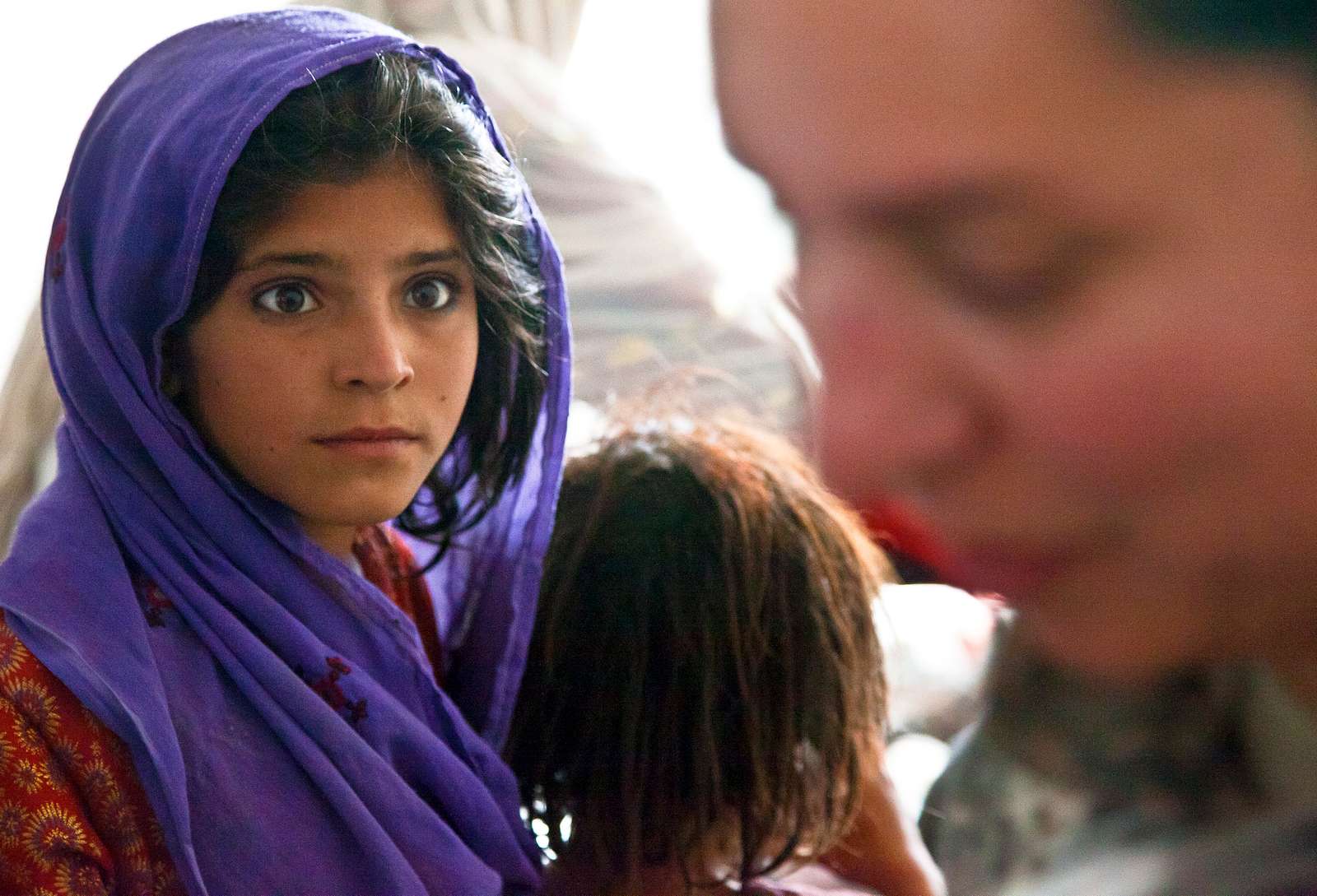 An Afghan Girl Stares At A U S Army Soldier During Nara And Dvids Public Domain Archive Public