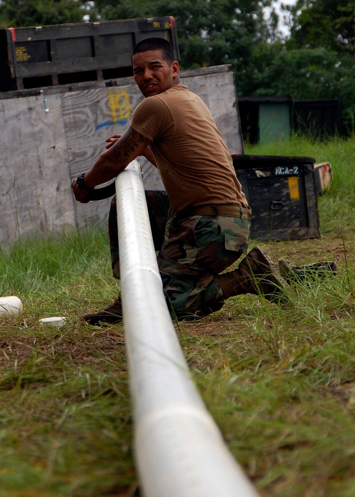 A Seabee Assigned To Naval Mobile Construction Battalion - NARA & DVIDS ...