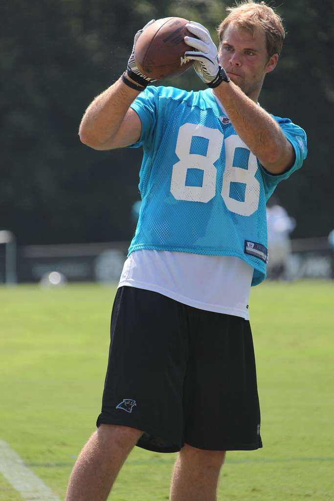 FILE- In this Sunday, Nov. 26, 2017, file photo, Carolina Panthers tight  end Greg Olsen (88) warms up prior to an NFL football game against the New  York Jets in East Rutherford