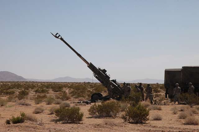 A M-777 A2 weapon system prepares to fire an Excalibur - PICRYL ...